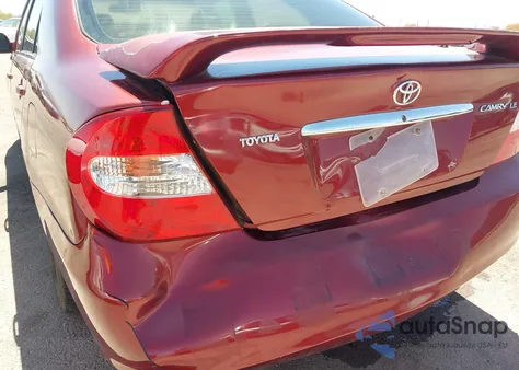 2002 Toyota Camry Le z USA, uszkodzony, nr VIN 4T1BE32K52U082454